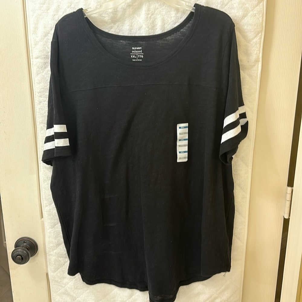 Black T shirt, Women’s XXL with white stripes on the sleeves. NWT